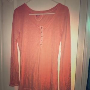 A thin long sleeved flowered shirt